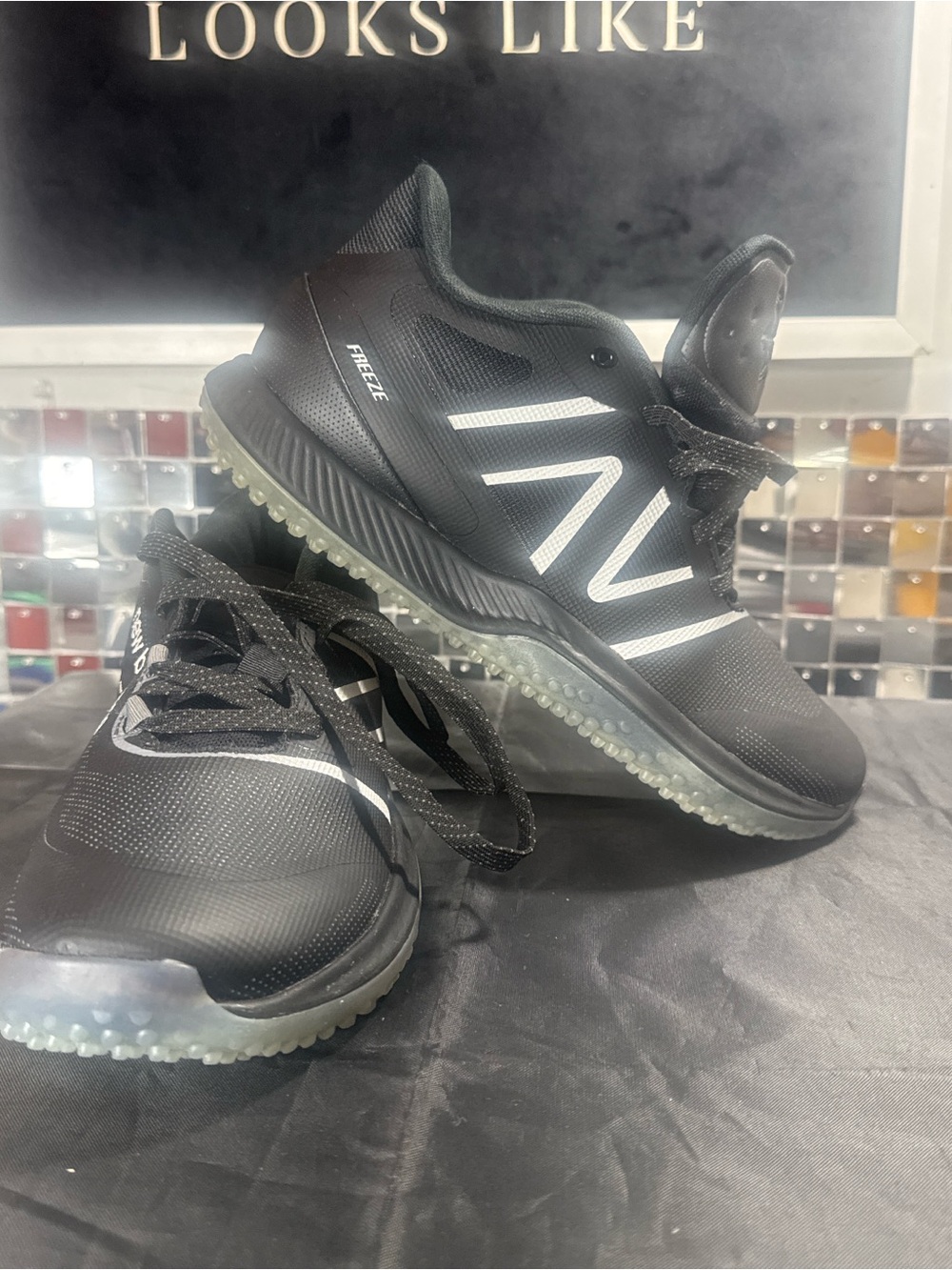 New Balance Black Sneakers with White Accents and Translucent Outsole
